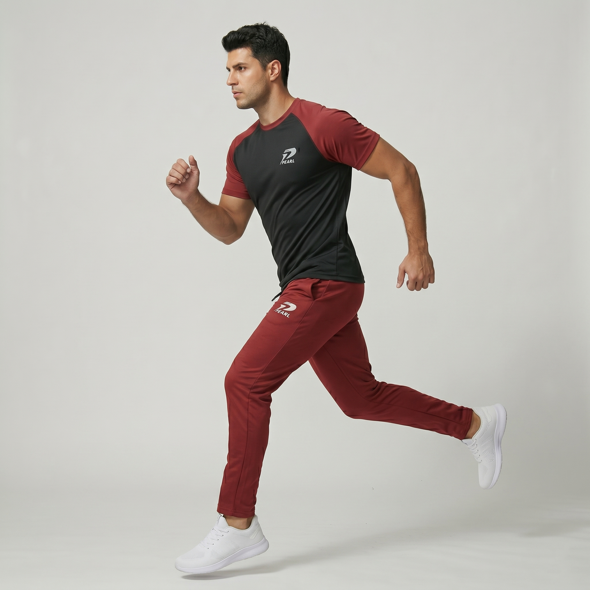 Black performance joggers with crimson red stripe detail - Pearl Brand
